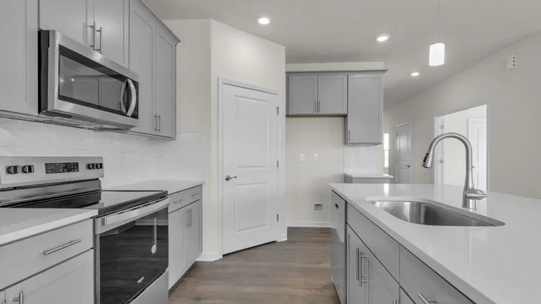 Furnished interior view inside a new home in The Villas at Kinsley, Jamestown (Image 3). Furnished interior view inside a new home in The Villas at Kinsley, Jamestown (Image 3).