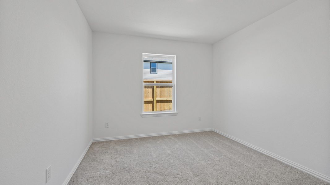 Furnished interior view inside a new home in Oakwood Estates, Waller (Image 10).