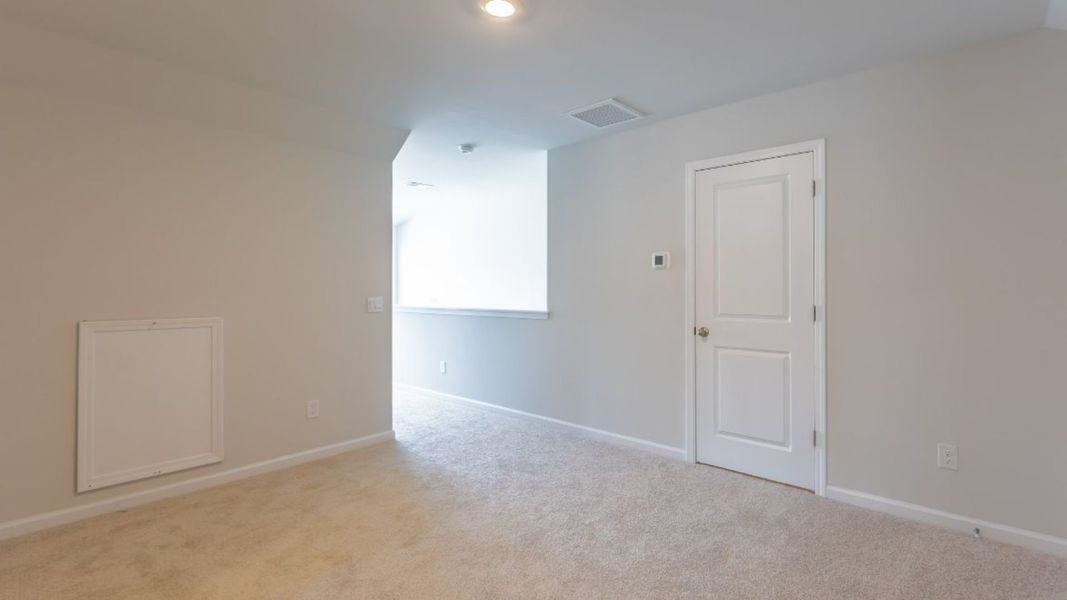 Representative unfurnished interior of a home built from the ARCHER by D.R. Horton in Rivers Reach, Yemassee (Image 21).
