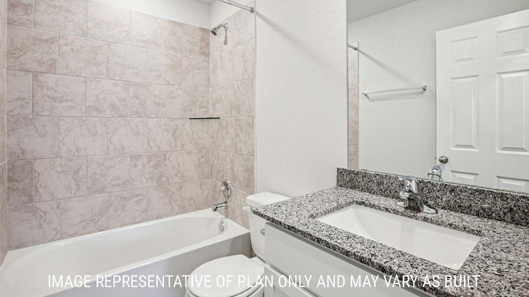 Representative furnished interior of a home built from the Estero by D.R. Horton in The Villages at Schwertner Ranch, Jarrell (Image 10).