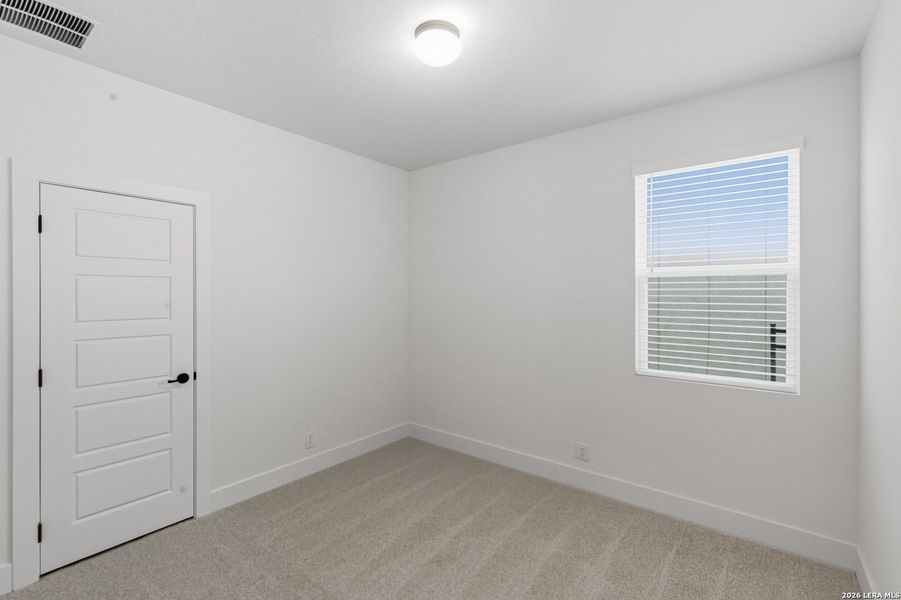 Spacious, unfurnished interior of a new home in Centero at Stone Oak, San Antonio (Image 17).