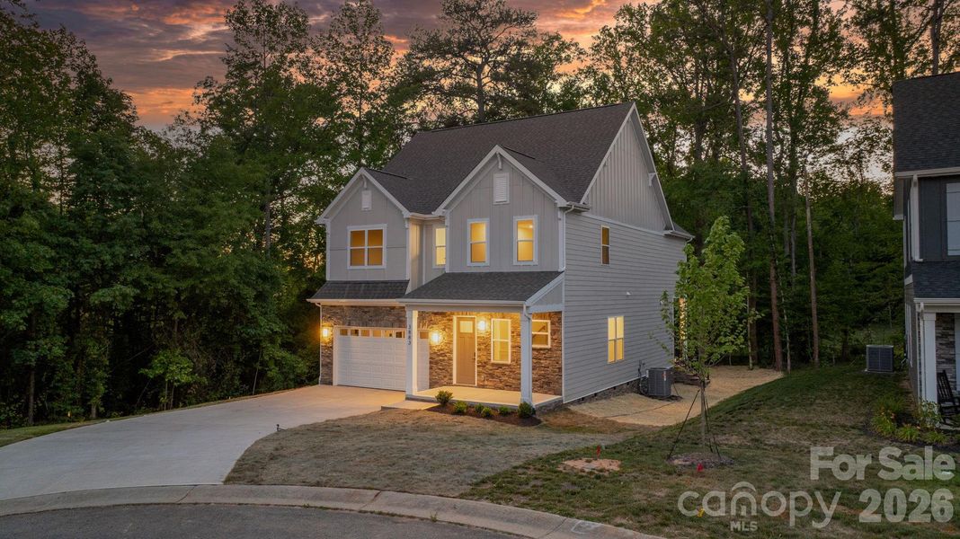 Front exterior of a new home in , Hickory, NC, highlighting curb appeal (Image 27).