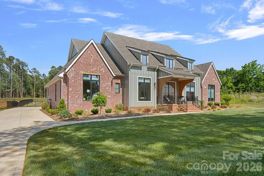 Front exterior of a new home in , Mooresville, NC, highlighting curb appeal (Image 2). Front exterior of a new home in , Mooresville, NC, highlighting curb appeal (Image 2).