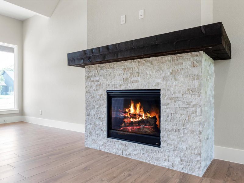 Closer view of the cozy fireplace. Closer view of the cozy fireplace.