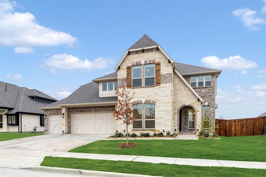 Front exterior of a new home in Villages of Hurricane Creek, Anna, TX, highlighting curb appeal (Image 20).