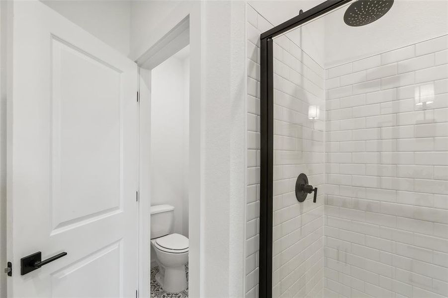 Shower in primary bath (*Photo not of actual home and used for illustration purposes only.)