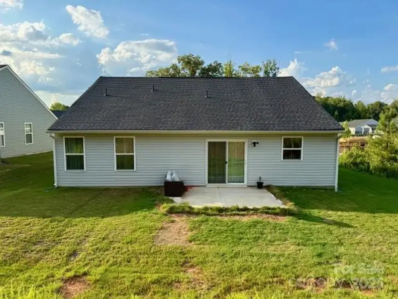 Exterior details and patio area of a home in Rosegate, Lancaster (Image 15).