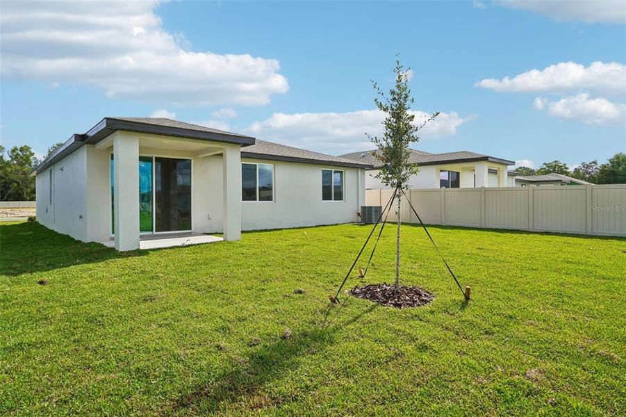 Exterior details and patio area of a home in Pine Ridge Meadows, Hudson (Image 4).