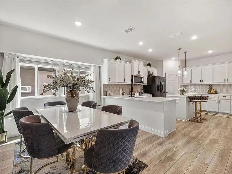 Dining space featuring light hardwood / wood-style floors