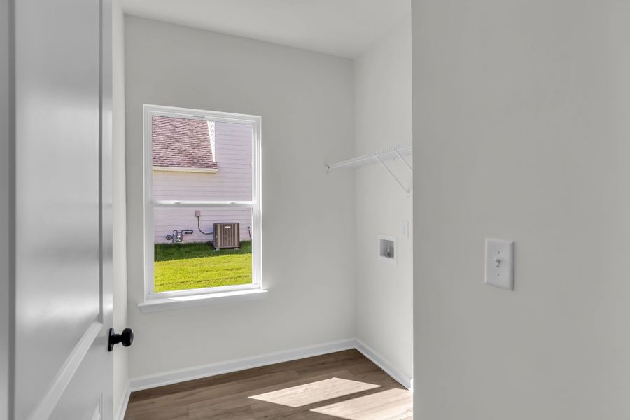 Laundry room with natural lighting!