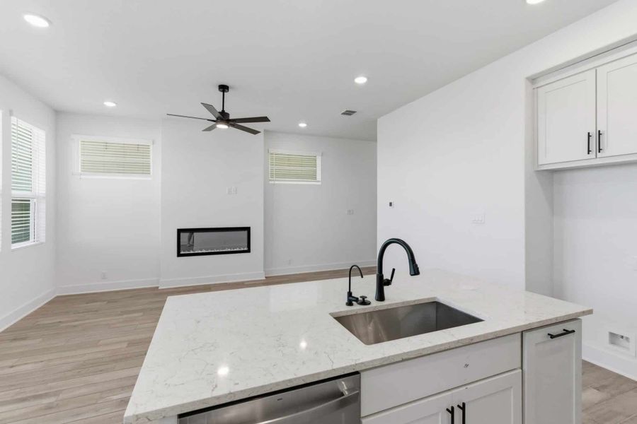 Furnished interior view inside a new home in Centero at Stone Oak, San Antonio (Image 10).