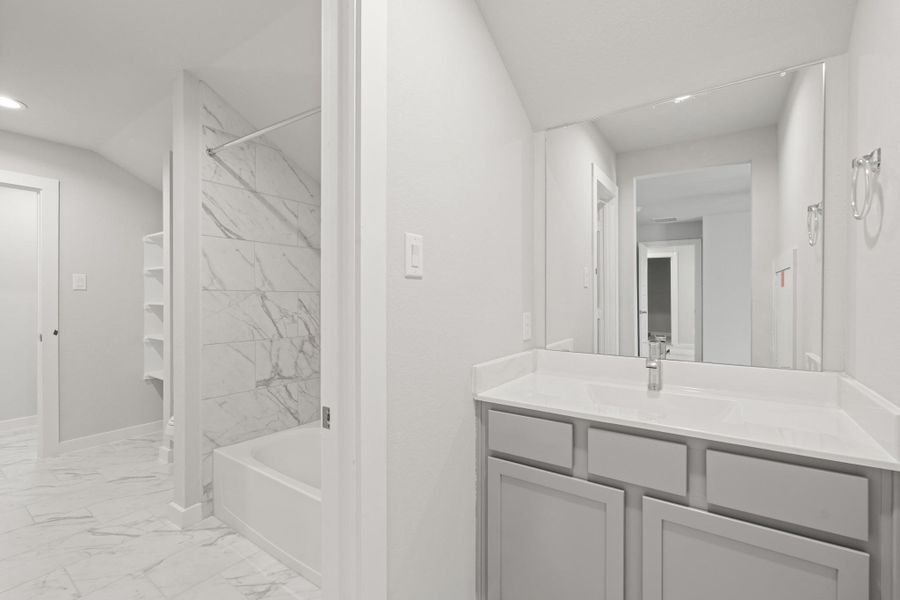 Furnished interior view inside a new home in Sunterra, Katy (Image 5).