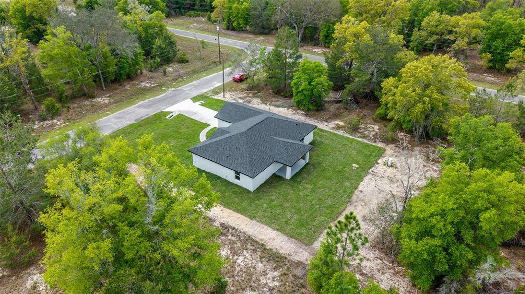 Front exterior of a new home in , Ocklawaha, FL, highlighting curb appeal (Image 20).