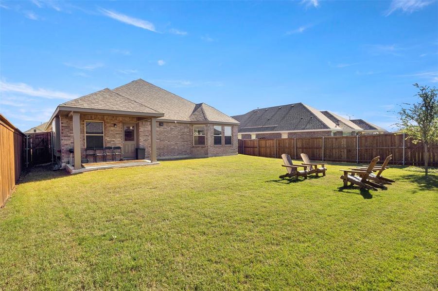 Front exterior of a new home in Light Farms - Sweetwater, Celina, TX, highlighting curb appeal (Image 1).
