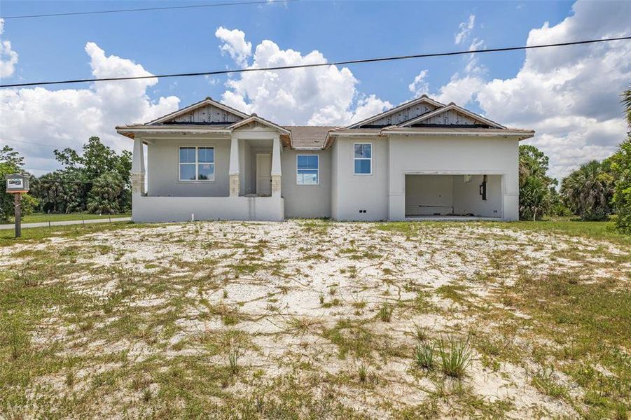 Front exterior of a new home in , Punta Gorda, FL, highlighting curb appeal (Image 2). Front exterior of a new home in , Punta Gorda, FL, highlighting curb appeal (Image 2).