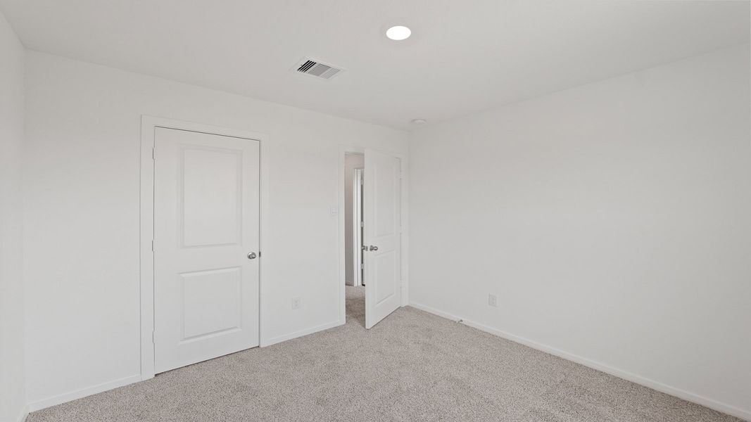 Representative unfurnished interior of a home built from the Davis by D.R. Horton in Lake Conroe Cove, Willis (Image 21).