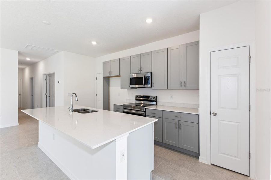 Furnished interior view inside a new home in Mirror Lake Village, Fruitland Park (Image 3).
