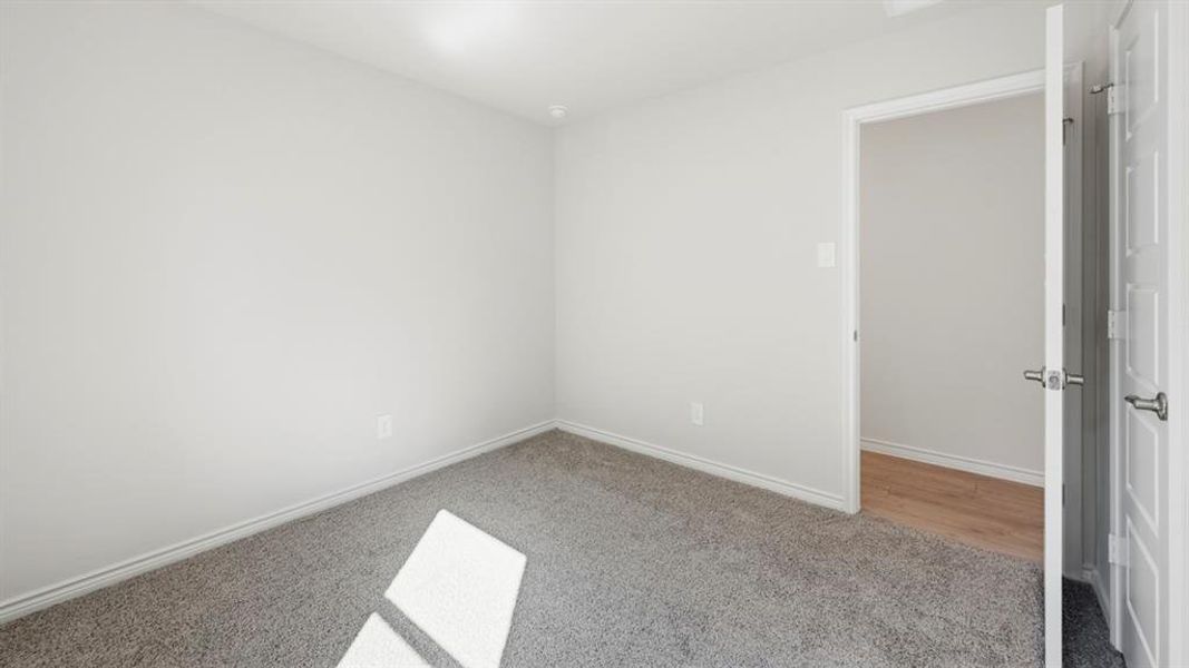 Spacious, unfurnished interior of a new home in The Woods at Lindsey Place, Anna (Image 22).