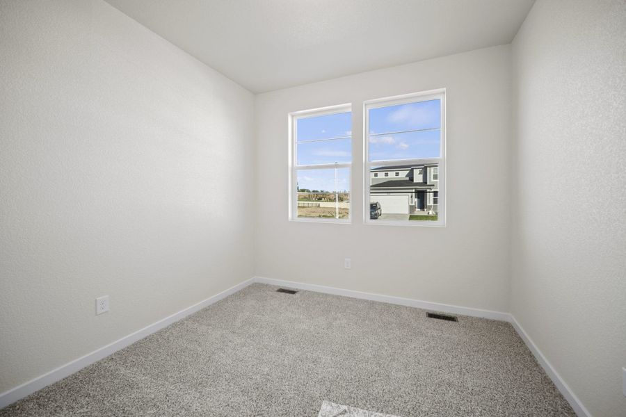 Spacious, unfurnished interior of a new home in The Trails at Aspen Ridge, Colorado Springs (Image 15).