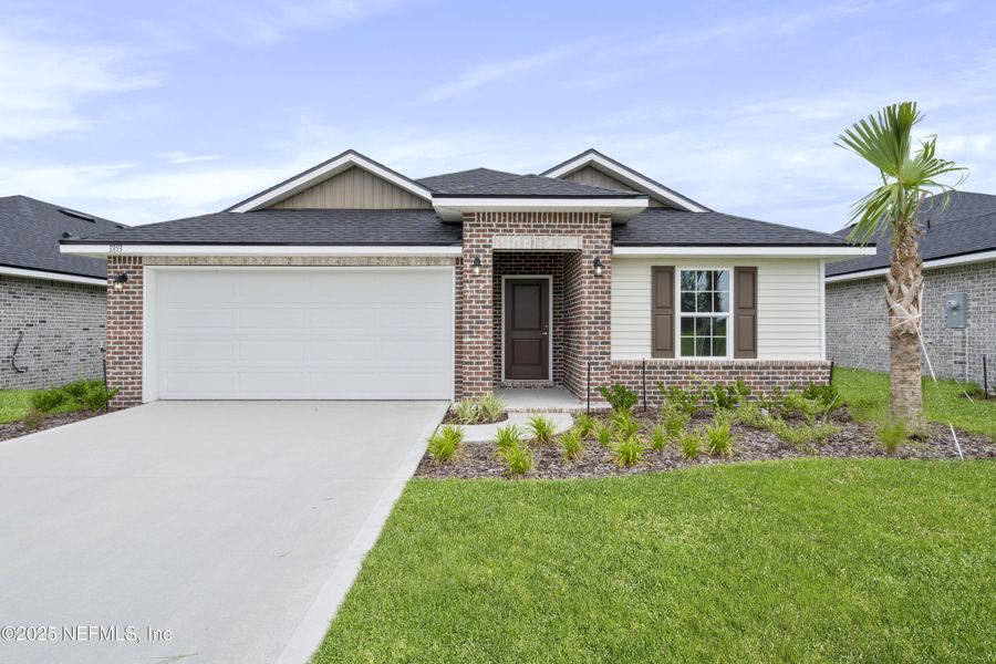 Front exterior of a new home in Shadow Crest at Rolling Hills, Green Cove Springs, FL, highlighting curb appeal (Image 18).