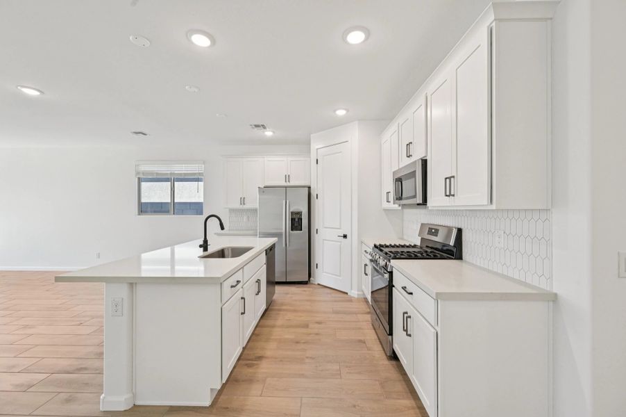 Kitchen featuring the Harmony Collection. Not actual home, finishes may vary. Kitchen featuring the Harmony Collection. Not actual home, finishes may vary.
