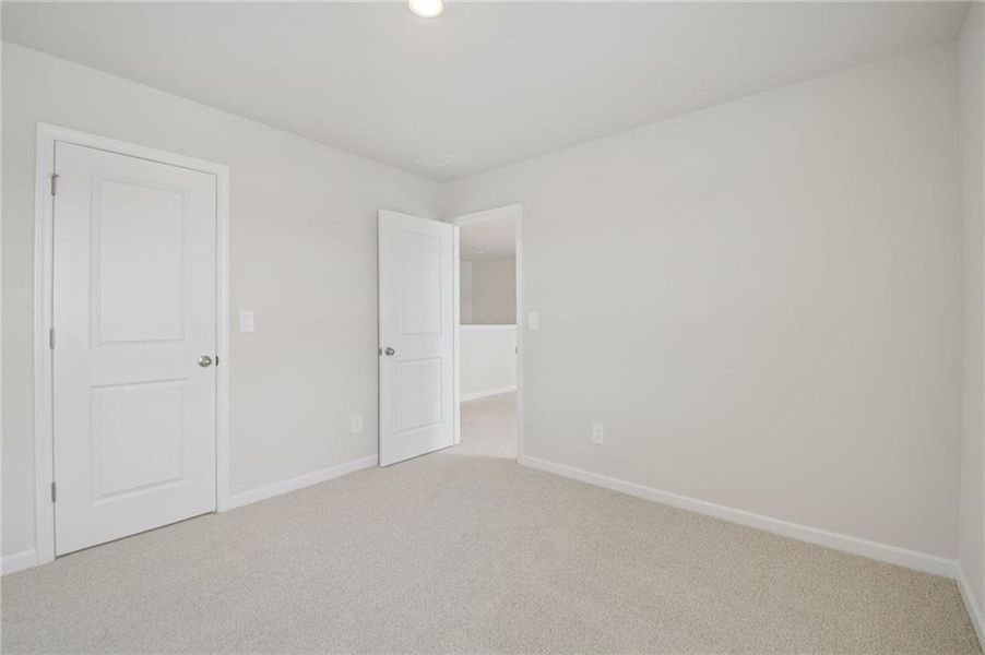 Spacious, unfurnished interior of a new home in Northwoods at Mirror Lake, Villa Rica (Image 34).