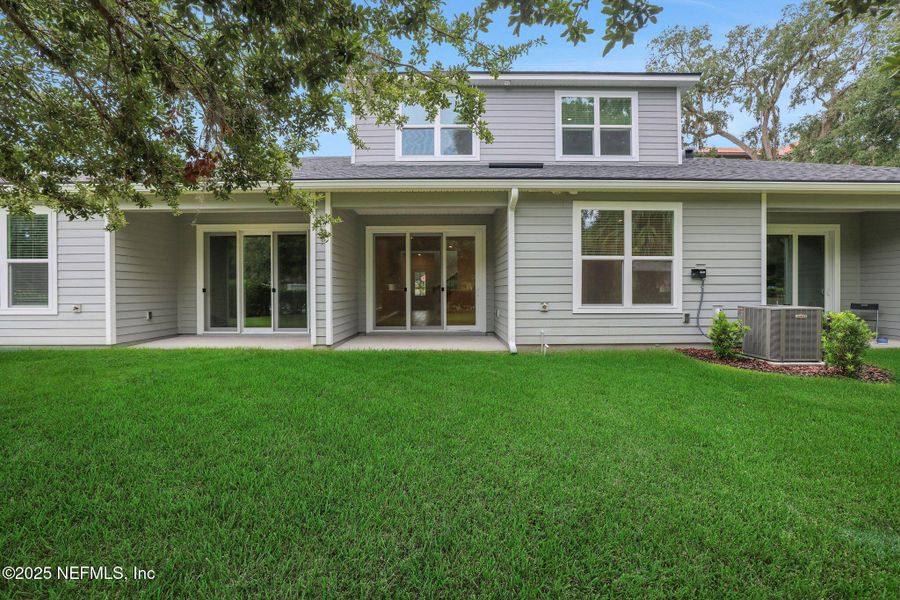 Front exterior of a new home in The Hammock at Palm Harbor, Palm Coast, FL, highlighting curb appeal (Image 2).
