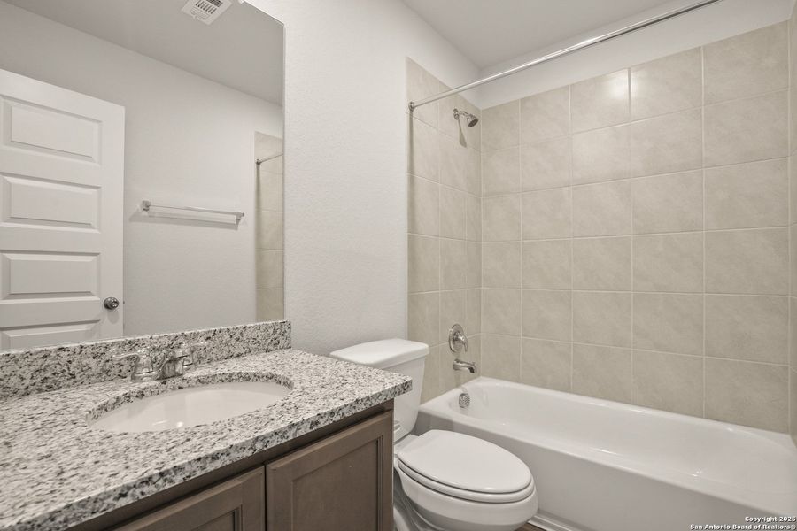 Furnished interior view inside a new home in Hunters Ranch, San Antonio (Image 4).
