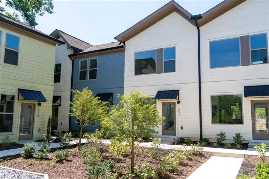 Front exterior of a new home in , Atlanta, GA, highlighting curb appeal (Image 14).