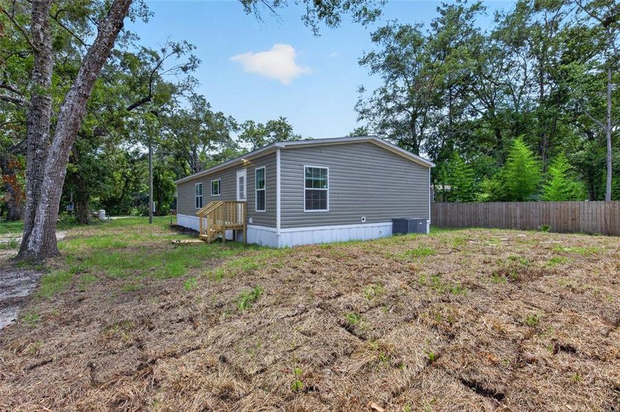 Exterior details and patio area of a home in , Brooksville (Image 26).