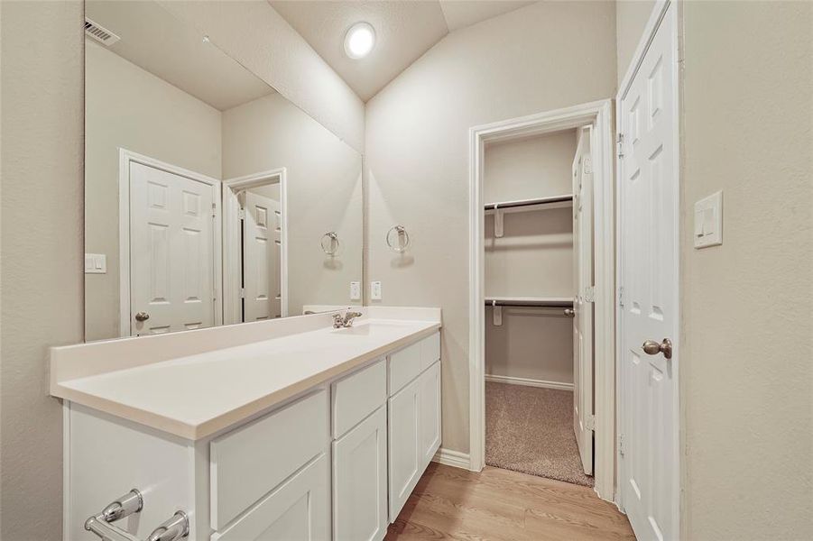 Primary bathroom with walk in closet