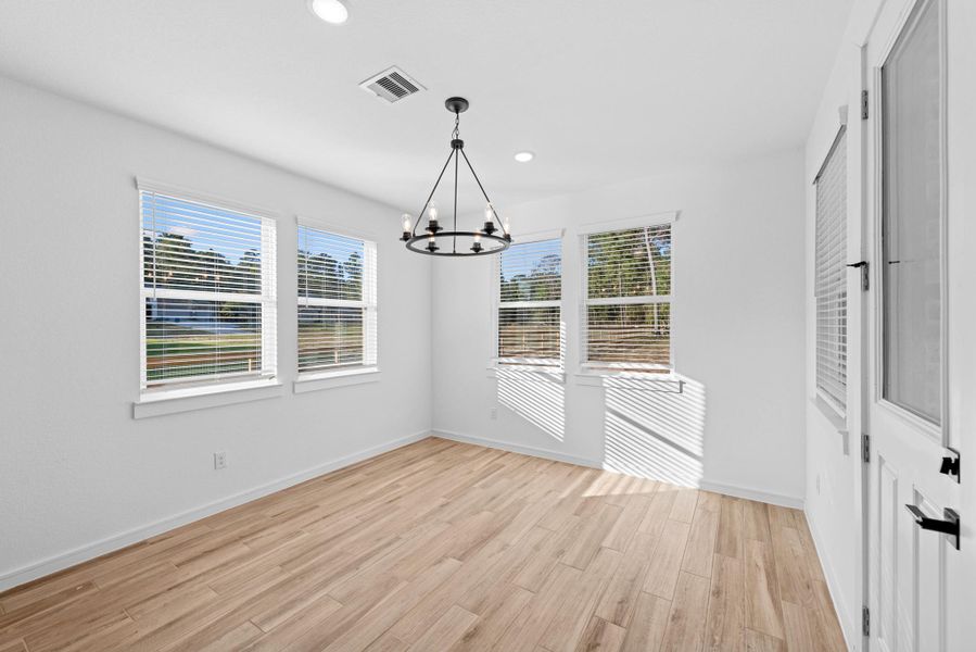 Sun-lit dining area (*Photo not of actual home and used for illustration purposes only.)