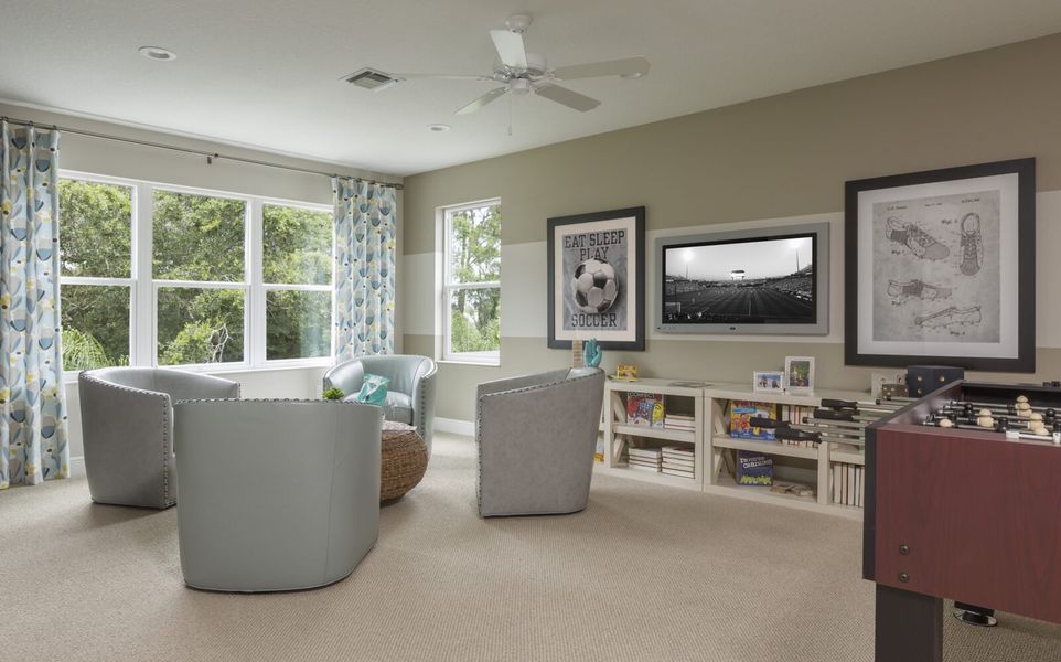 Representative furnished interior of a home built from the Kiawah 2 by Neal Communities in Verandah, Fort Myers (Image 11).