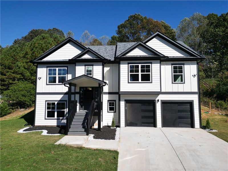 Front exterior of a new home in , Talmo, GA, highlighting curb appeal (Image 15). Front exterior of a new home in , Talmo, GA, highlighting curb appeal (Image 15).