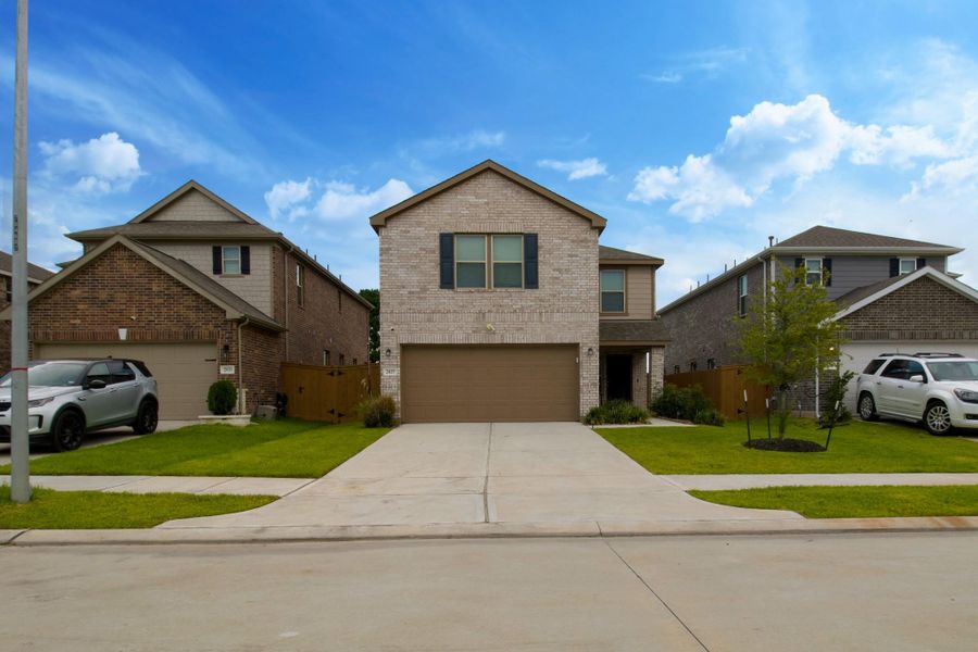 Front exterior of a new home in , Katy, TX, highlighting curb appeal (Image 20). Front exterior of a new home in , Katy, TX, highlighting curb appeal (Image 20).