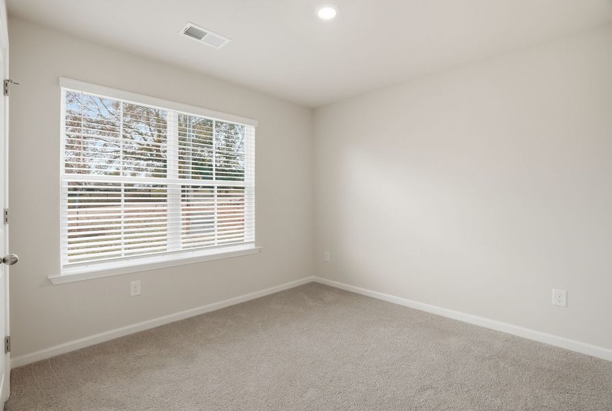Representative unfurnished interior of a home built from the Spruce L by McGuinn Homes in Sibley Village, Sumter (Image 25).