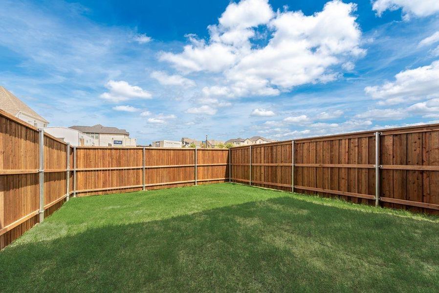 Exterior details and patio area of a home in Edgewater, Fate (Image 18).