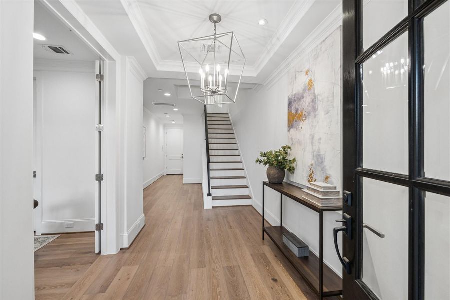 Welcome inside. 1 full bedroom on 1st floor + full bath, elevator and 3 car garage!