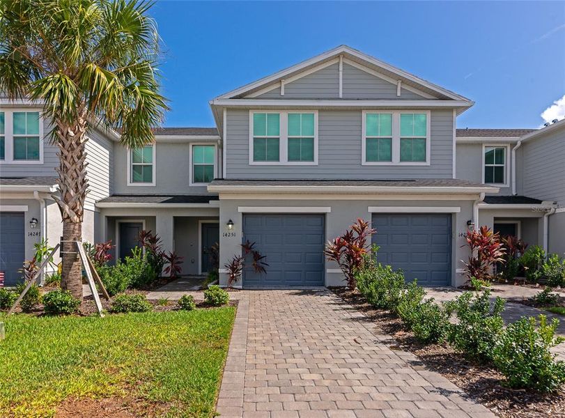 Front exterior of a new home in , Bradenton, FL, highlighting curb appeal (Image 1). Front exterior of a new home in , Bradenton, FL, highlighting curb appeal (Image 1).