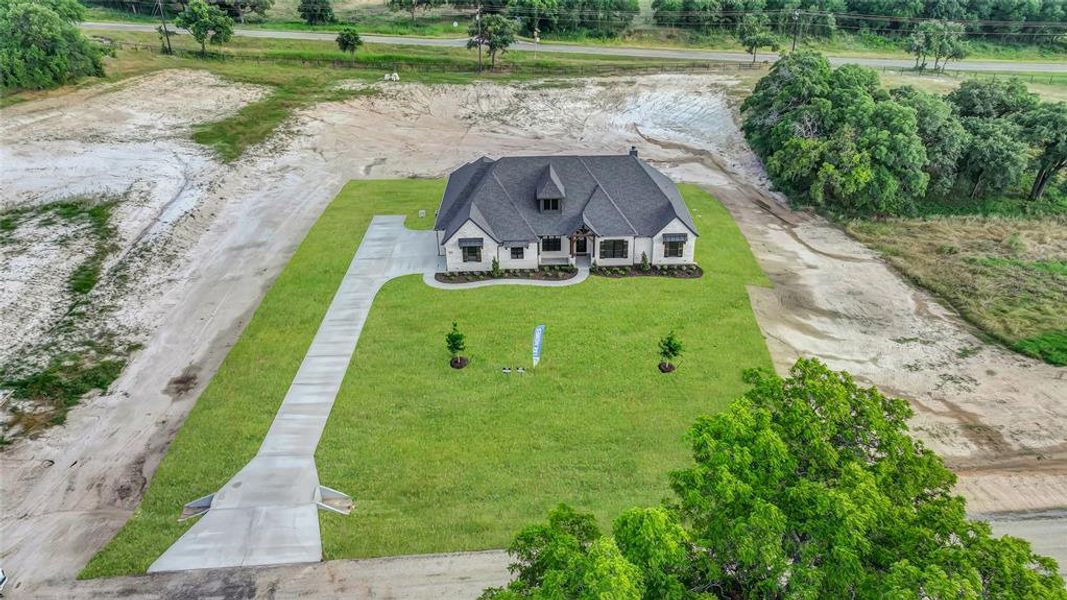 Front exterior of a new home in , Decatur, TX, highlighting curb appeal (Image 26).