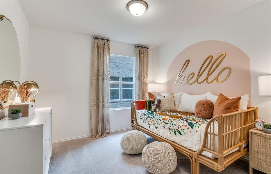 Spacious secondary bedroom with large window