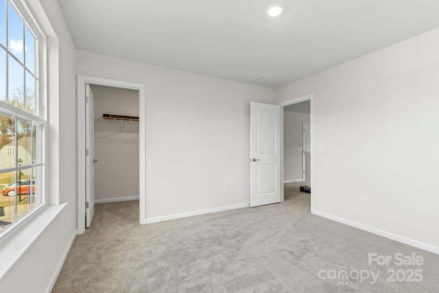 Spacious, unfurnished interior of a new home in Bell Farm: 60's, Statesville (Image 32).