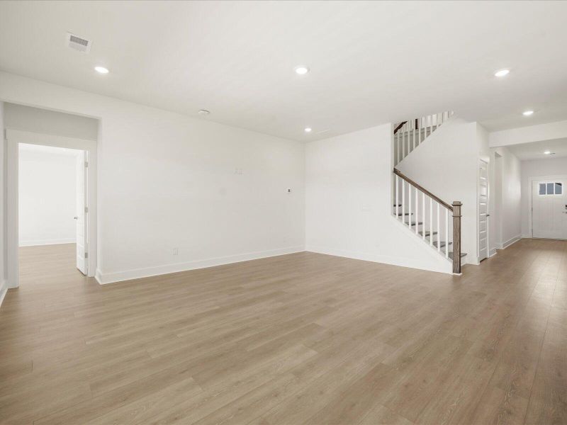 Spacious, unfurnished interior of a new home in The Coves at Lakes of Cane Bay II, Summerville (Image 23).