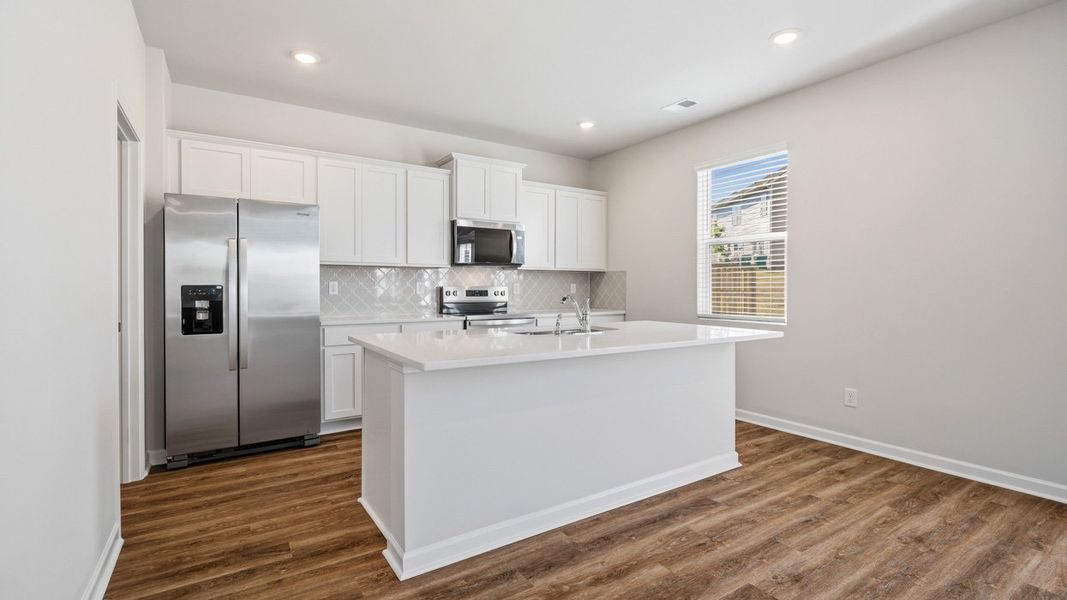 Furnished interior view inside a new home in The Reserve at Calcutta, Stockbridge (Image 5).