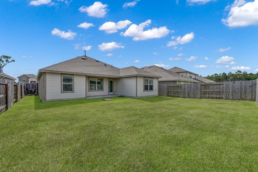 Front exterior of a new home in Tavola: Wildflower II Collection, New Caney, TX, highlighting curb appeal (Image 17).