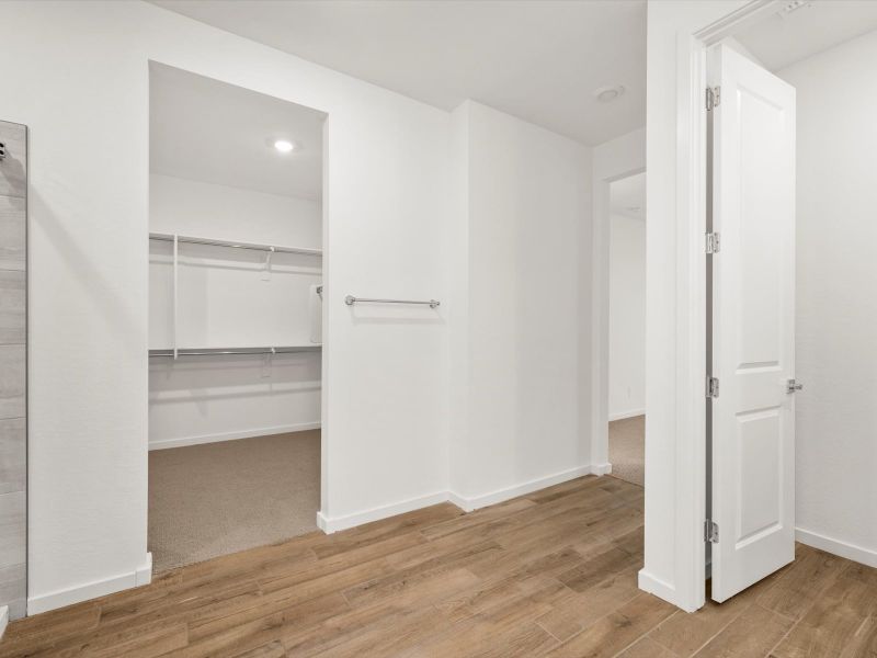 Spacious, unfurnished interior of a new home in Bella Vista Farms Reserve Series, San Tan Valley (Image 7).