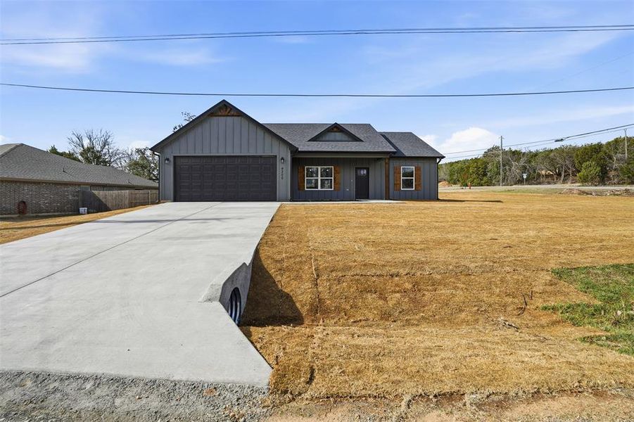 Front exterior of a new home in , Granbury, TX, highlighting curb appeal (Image 18). Front exterior of a new home in , Granbury, TX, highlighting curb appeal (Image 18).