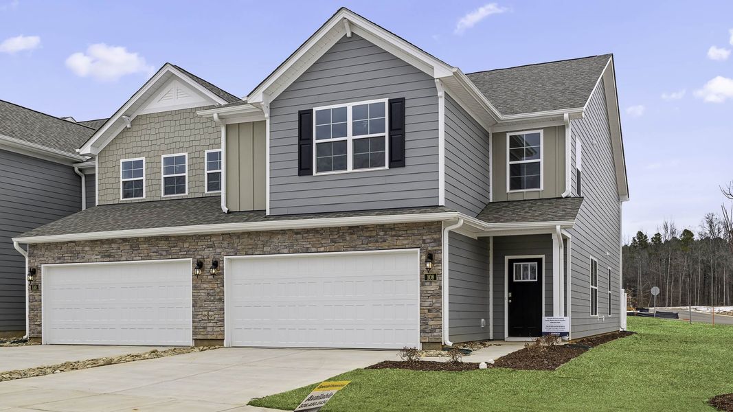 Front exterior of a new home in The Meadows at Kinsley, Jamestown, NC, highlighting curb appeal (Image 1). Front exterior of a new home in The Meadows at Kinsley, Jamestown, NC, highlighting curb appeal (Image 1).