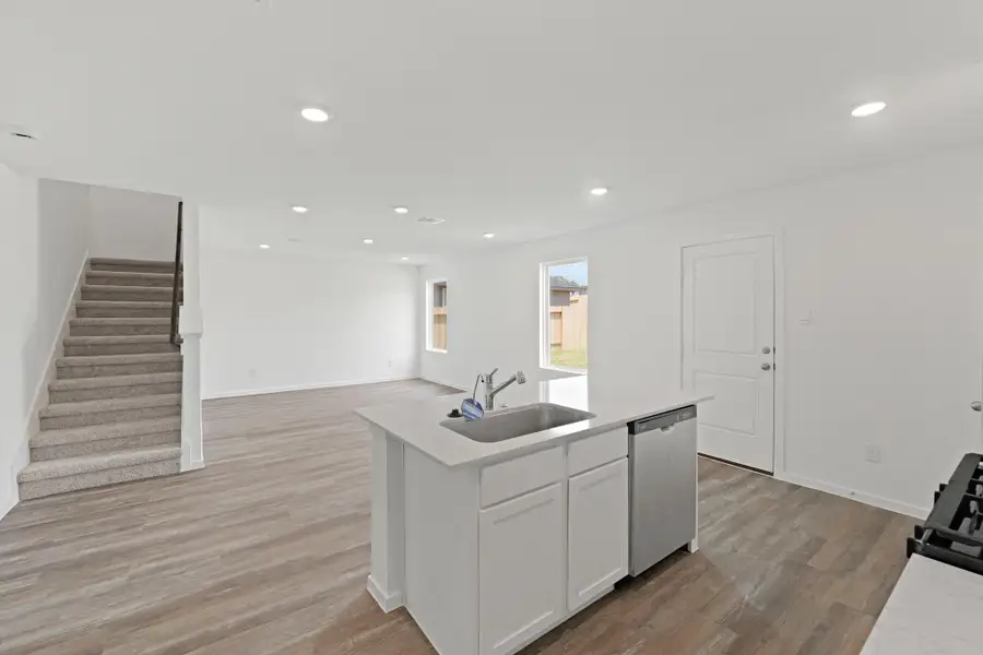 Furnished interior view inside a new home in Lexington Heights, Willis (Image 4).
