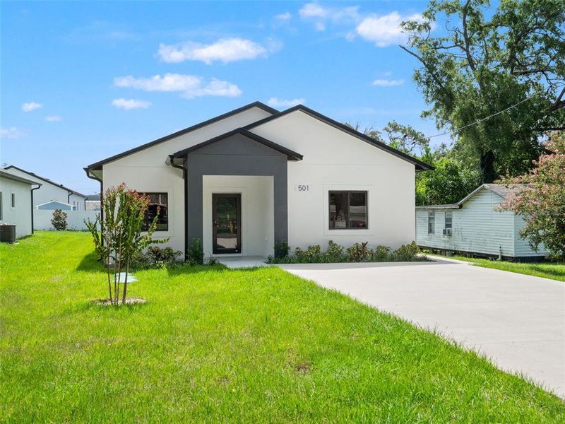 Front exterior of a new home in , Apopka, FL, highlighting curb appeal (Image 22). Front exterior of a new home in , Apopka, FL, highlighting curb appeal (Image 22).